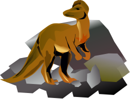A dinosaur in front of rocks